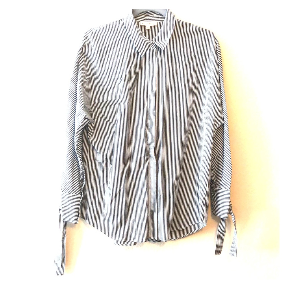 Pinstriped button down collared shirt